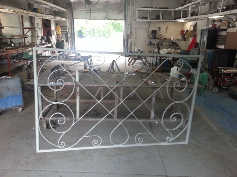 Scrollwork iron piece in the fabrication shop